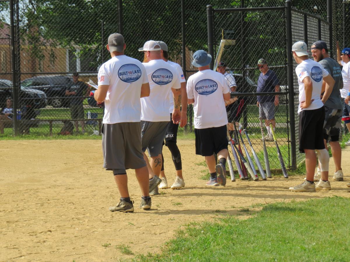 Lining up at the baseball diamond for Softball Tournament