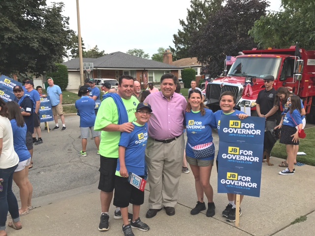 pritzker poses with family