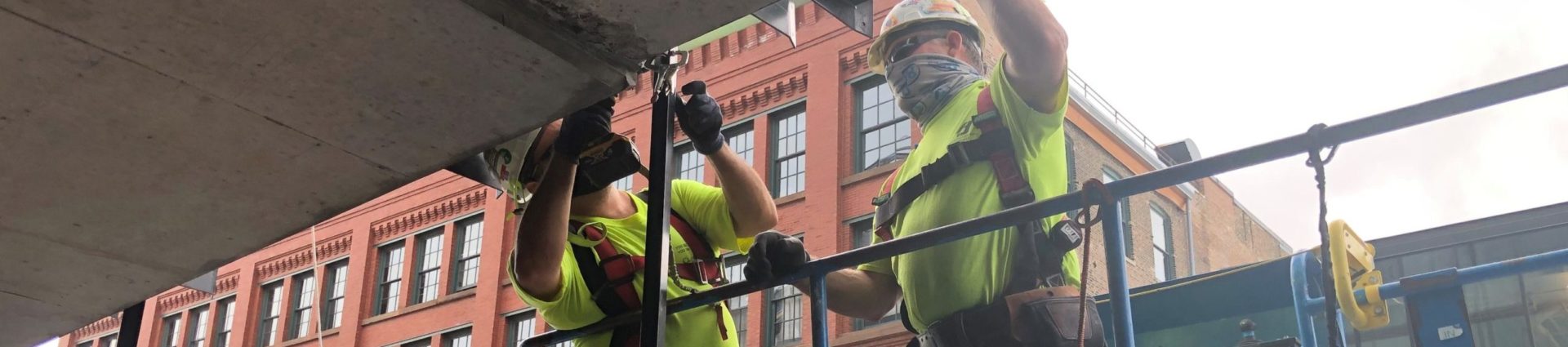 Construction Workers working on building