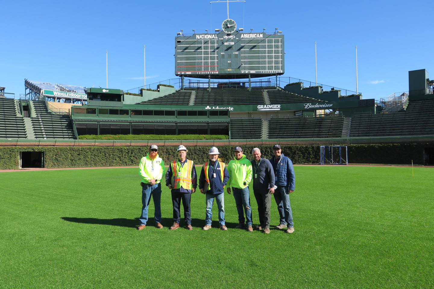 Carpenters pose at Wrigley Field