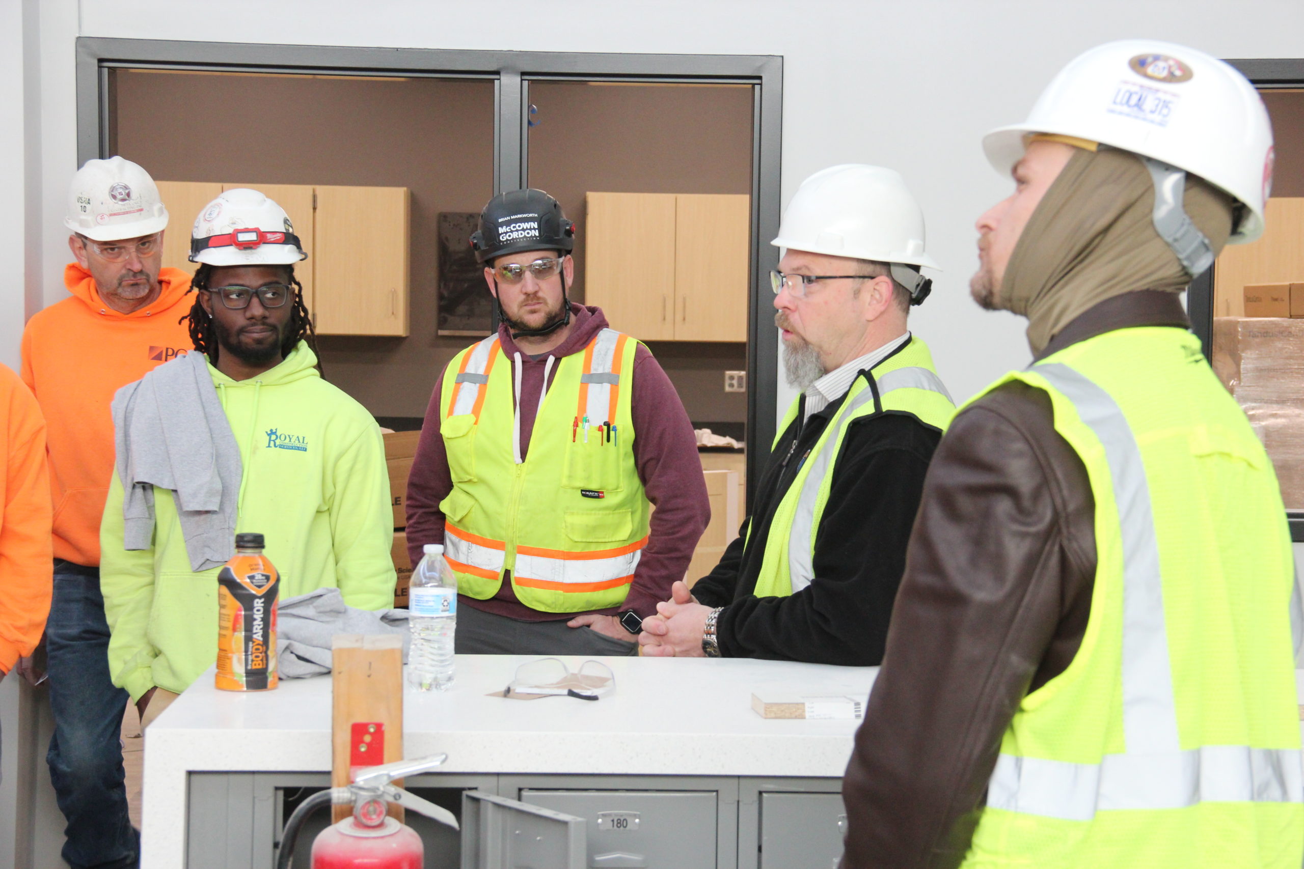 KC Regional Director Rocky Kloth speaks with carpenters